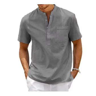 Men's solid colour stand collar short sleeve polo shirt laid flat.