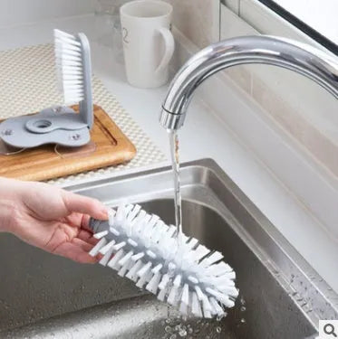 Grey double-head rotating cup brush with suction cups for wall mounting