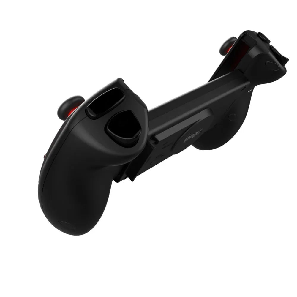 Red telescopic Bluetooth gamepad extended to hold a smartphone with USB cable