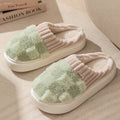 Women's plush indoor slipper in a choice of colours, showing round toe design, coral velvet upper, and textured non-slip PVC sole.