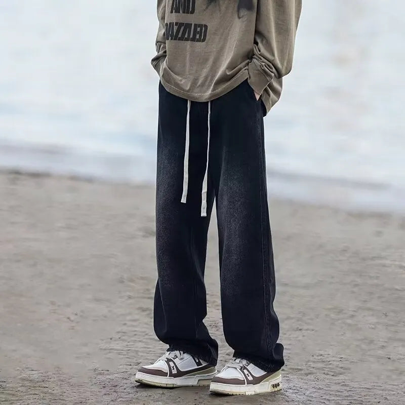 Blue straight-leg men's trousers with drawstring waist and cotton denim fabric