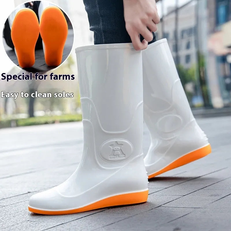 Men's flat washable plastic rain boot in white, showing high tube design and round toe.
