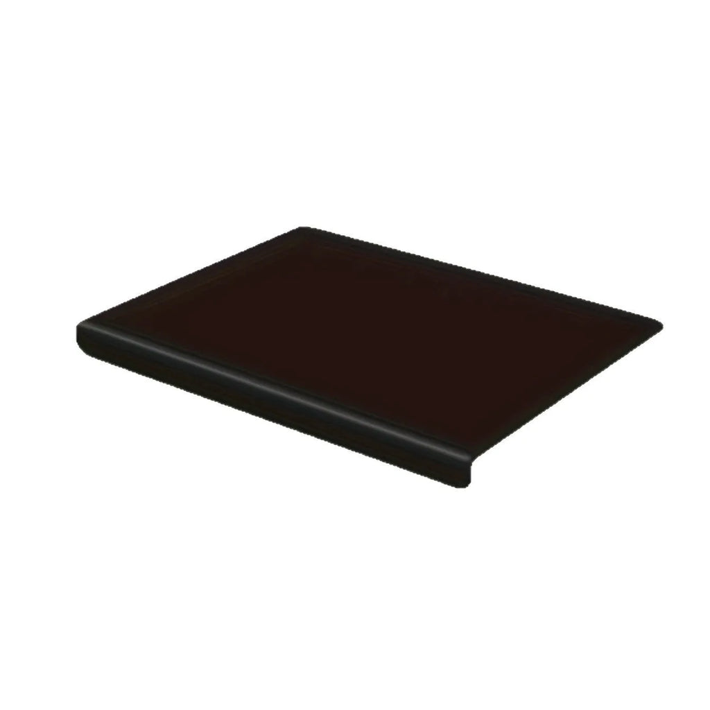 Black transparent acrylic chopping board in 30 x 20 cm size on a kitchen counter