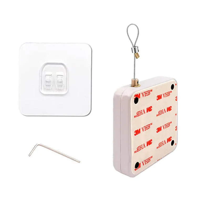 Automatic door closer with adhesive backing and transparent hook for punch-free installation on a door.