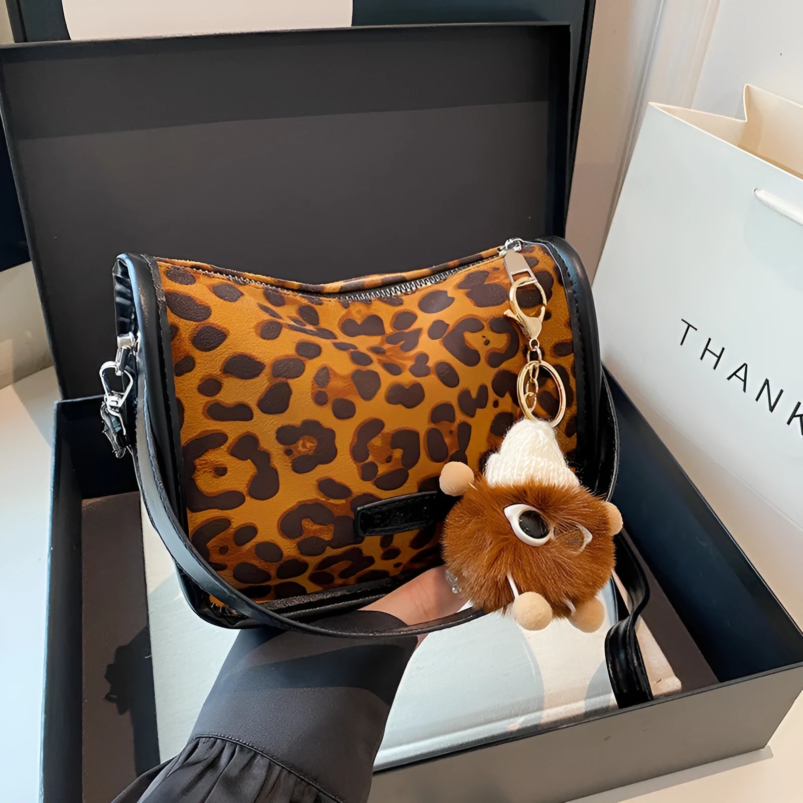 Horizontal square PU messenger bag with leopard print colour option and pendant detail