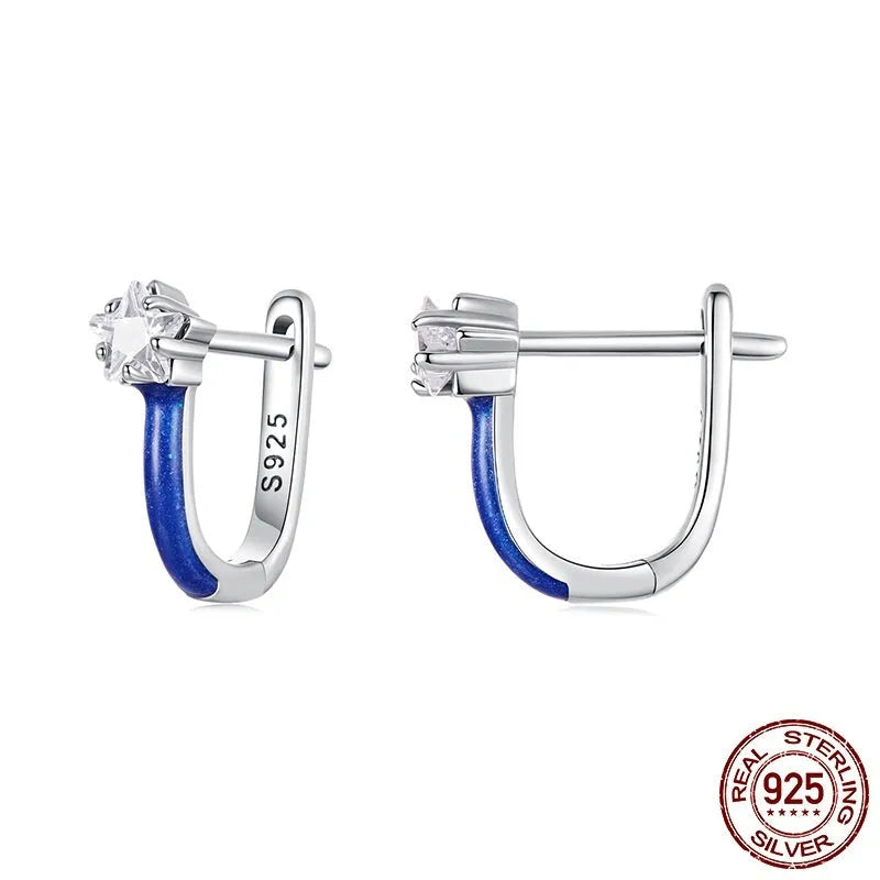 Pair of 925 sterling silver blue star pentagram ear clips with drip oil finish on white background
