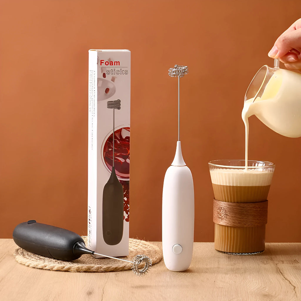 Electric hand-held milk frother in modern simplicity design for coffee preparation
