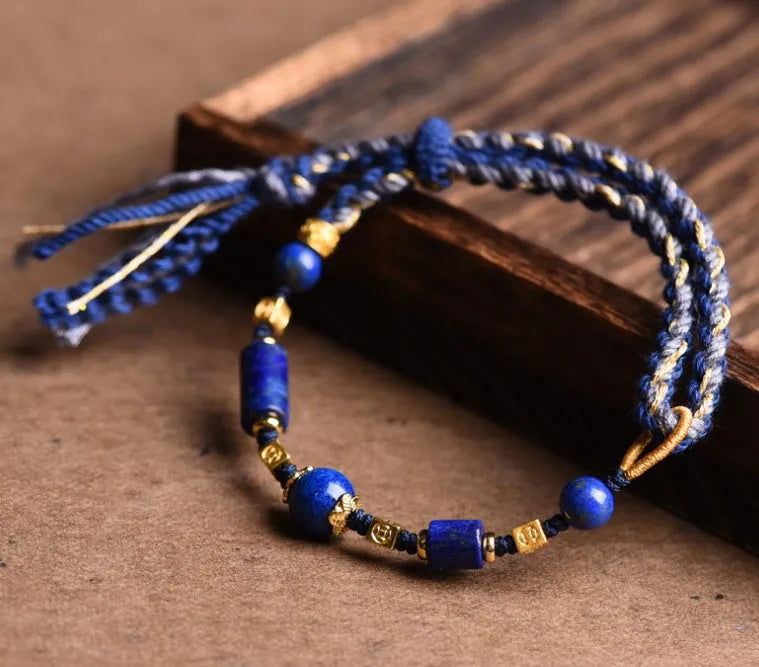 Hand woven ethnic bracelet with lapis lazuli colour and rope design on flexible wire