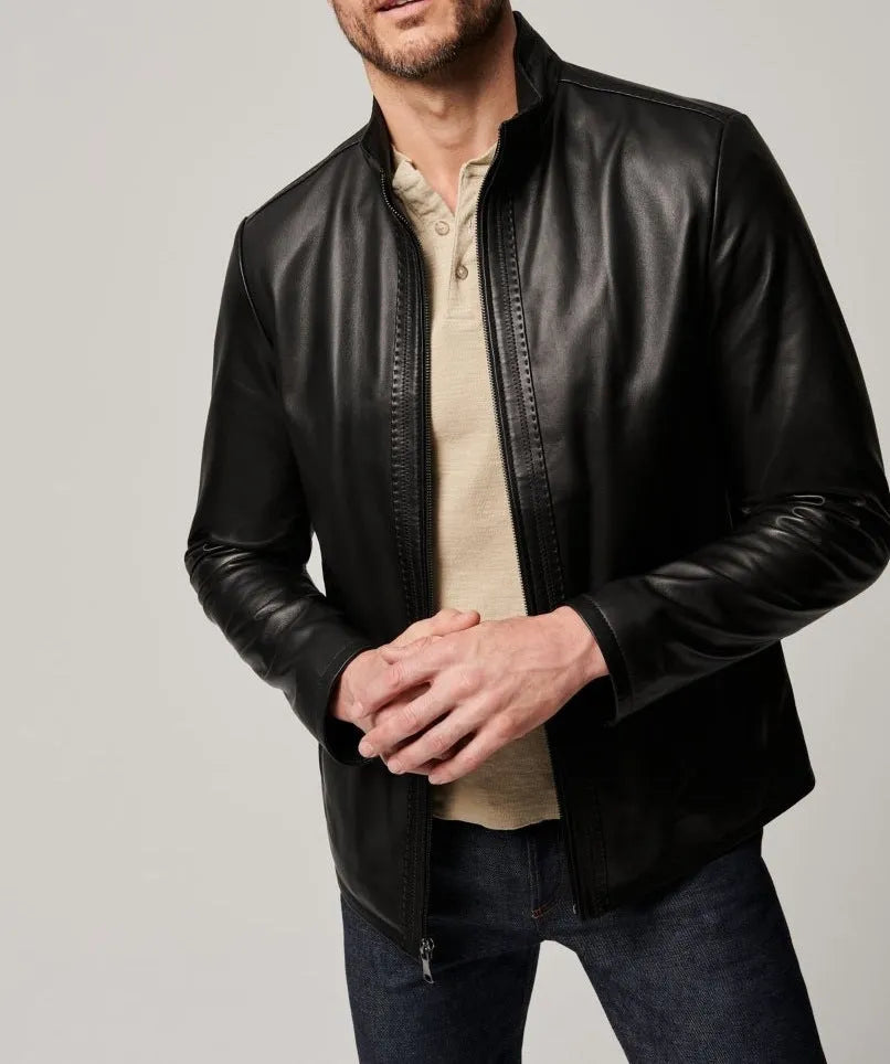 Man wearing a black retro-style leather-look jacket made from polyester fibre.