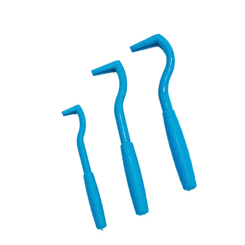 Three blue plastic tick removal hook tools for pets on a white background.