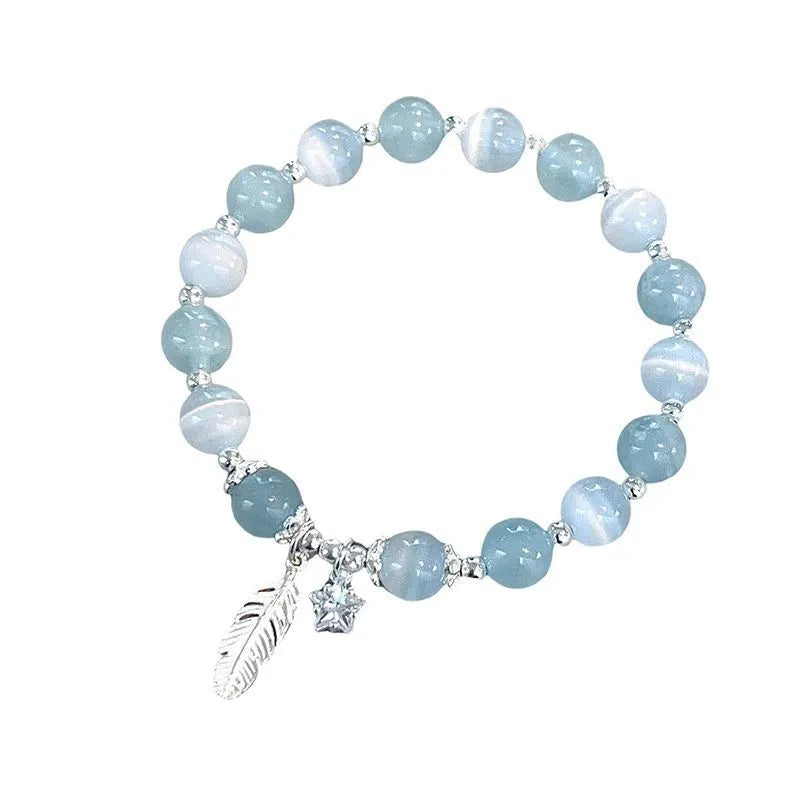 Crystal bracelet with Korean style design featuring letters text in blue moonlight colour