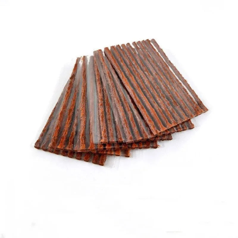 Brown and black vacuum car tire repair strips, 3.5mm x 100mm, made of butyl rubber.
