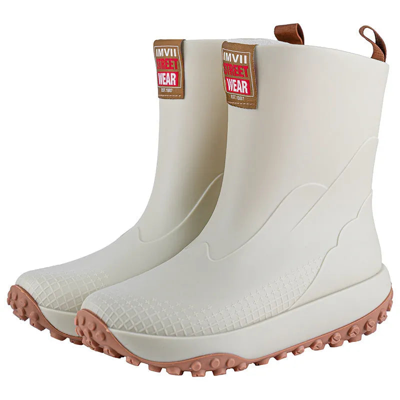 Men's mid tube PVC rain boots in beige colour with round toe and flat heel design