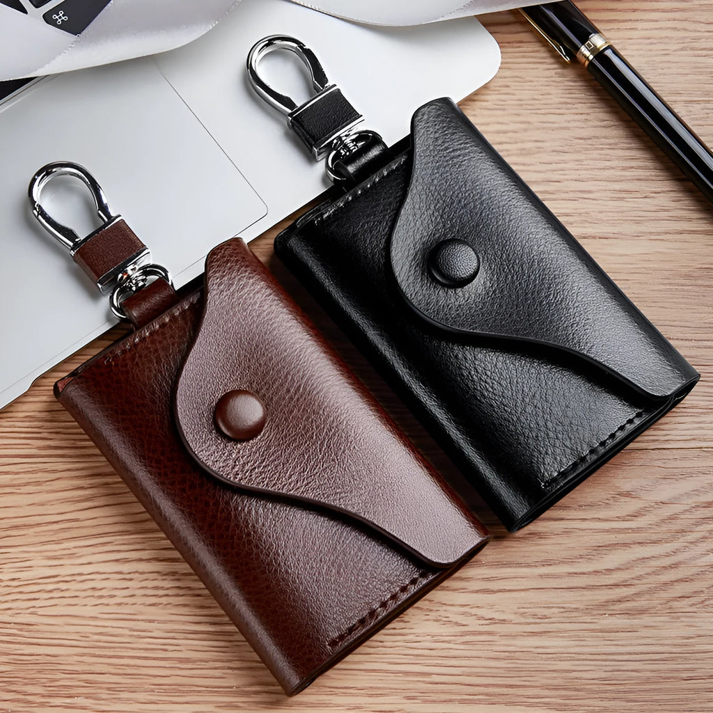 Square genuine leather keychain card holder with key ring in black colour.