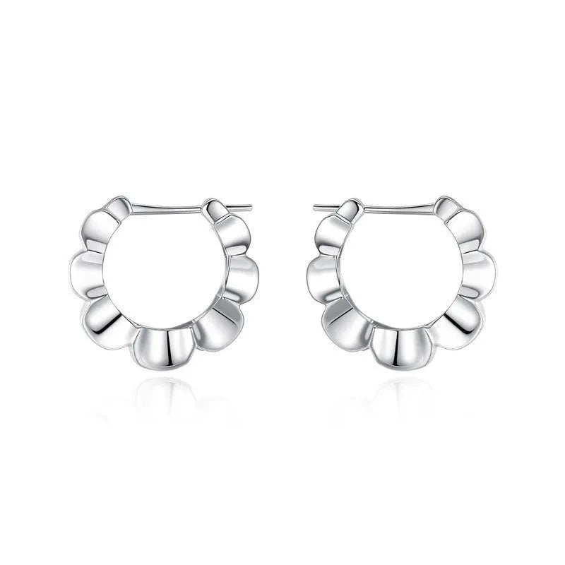Sterling silver geometric drop earrings with round retro design elements