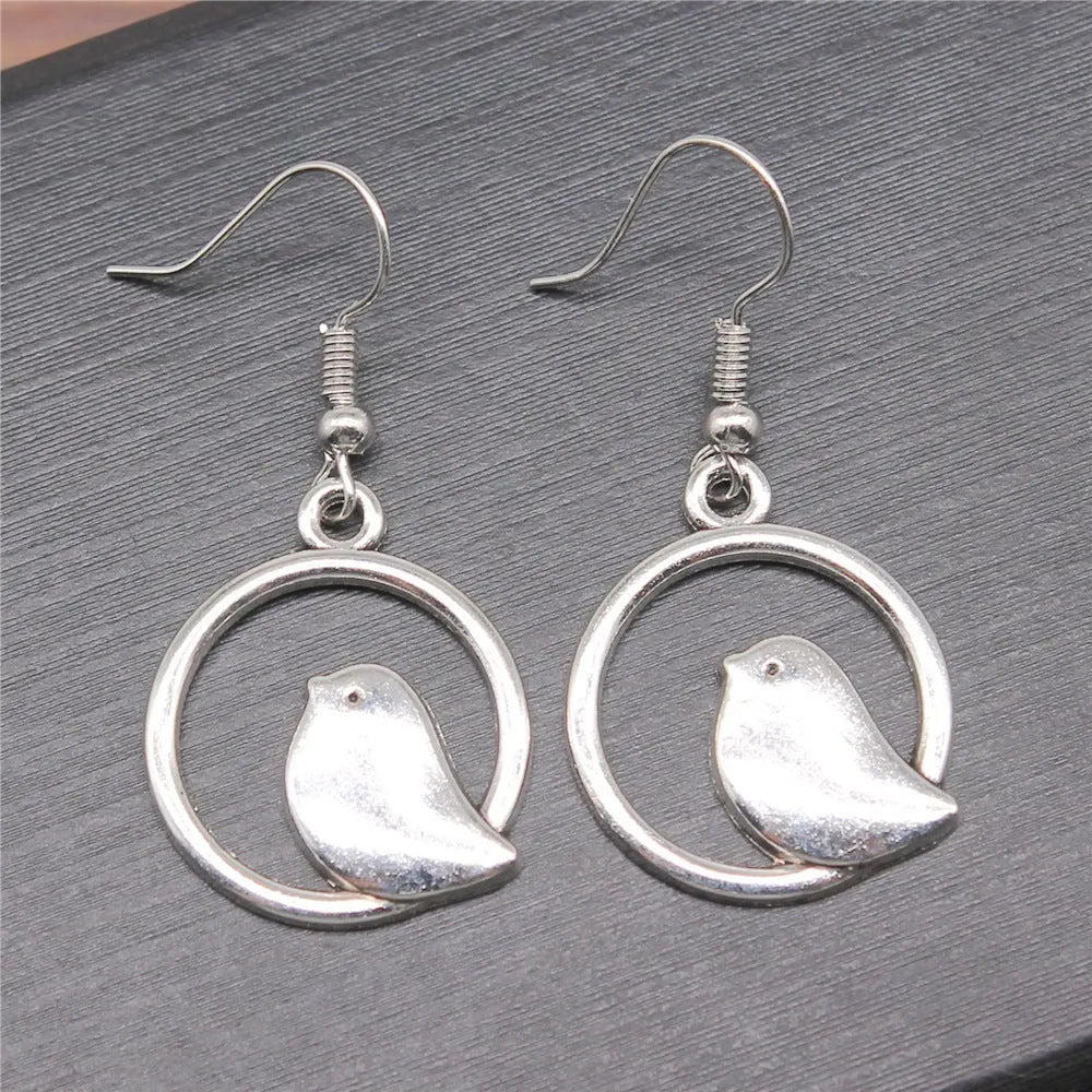 Retro simple handmade bird earrings in ancient silver finish with 20mm earring and 18x19mm ear hook