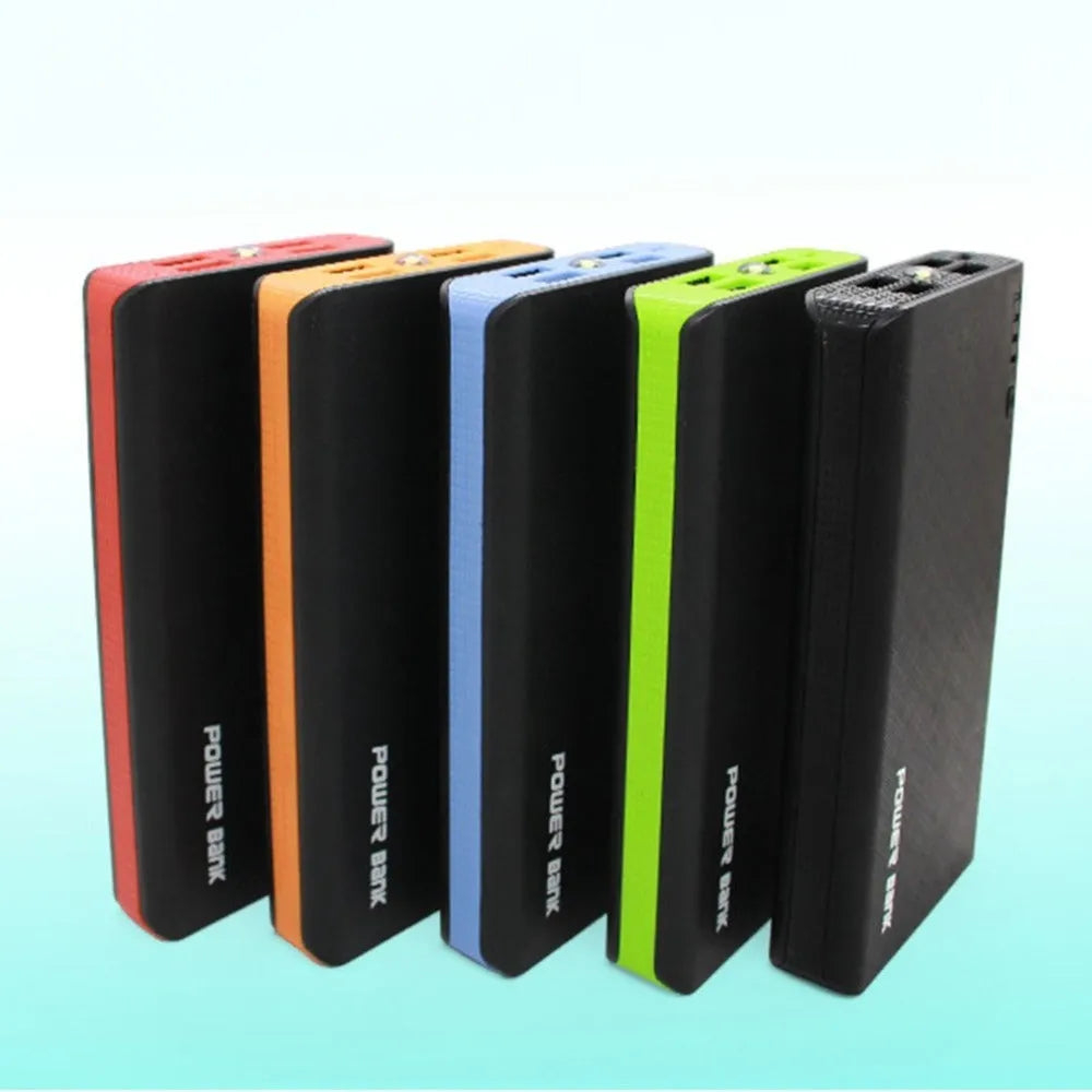 Red 20000mAh portable power bank showing size relative to a hand, with USB port visible.