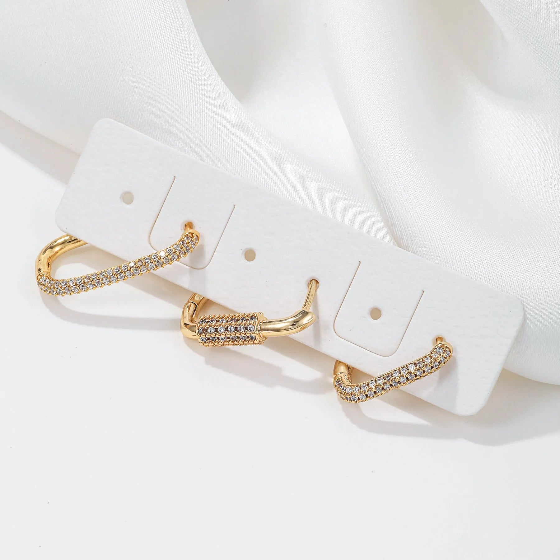 Set of three geometric zircon ear clips in gold and white finishes with square European style