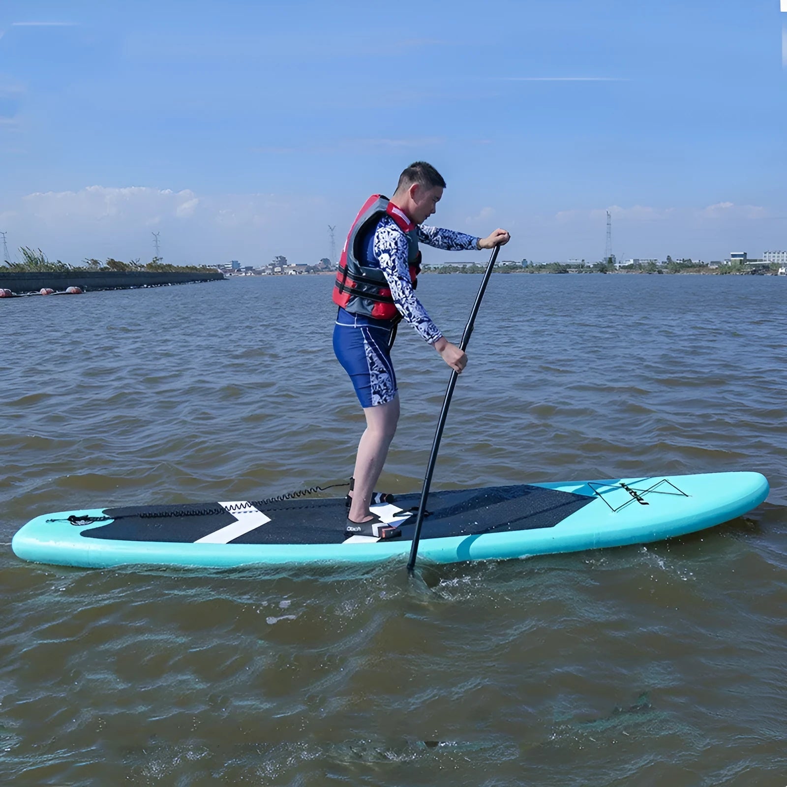 Inflatable stand up paddleboard 320x76cm green PVC with fin and foot rope on water