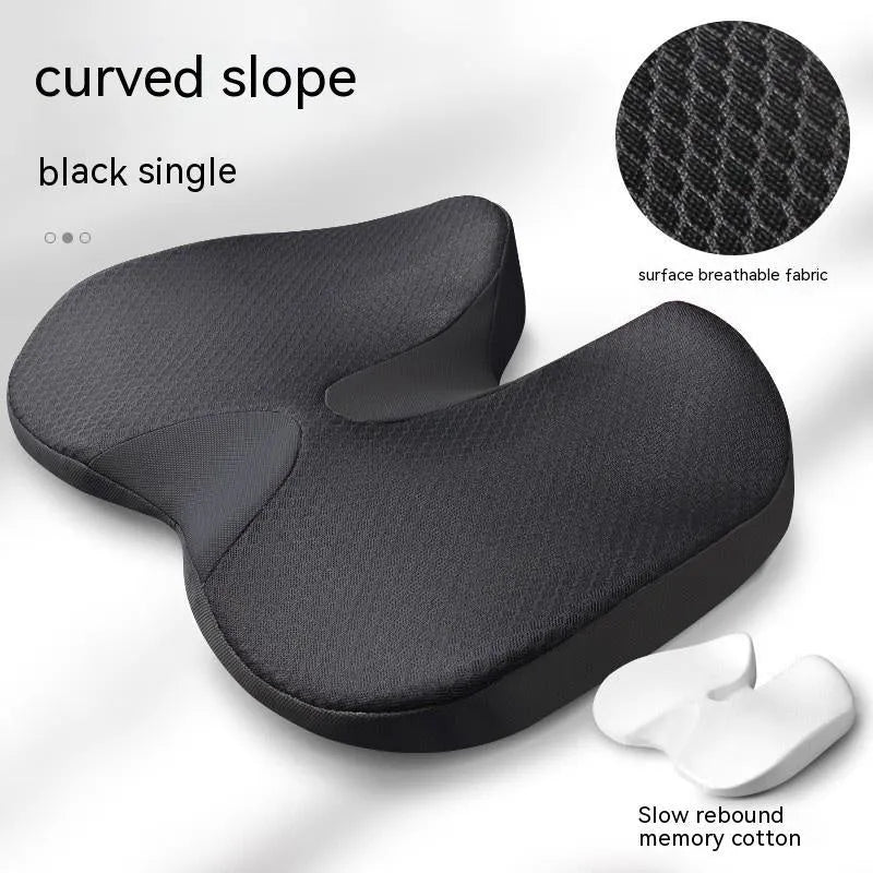 Curved bevel anal support seat cushion in solid colour on a car seat.