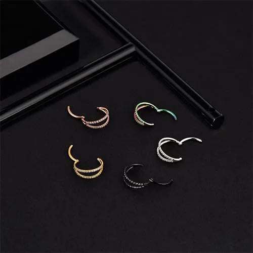 G23 titanium alloy nose ring with zircon detail in gold and steel colours, showing 1.0mm and 1.2mm diameter options.