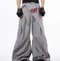 Boy wearing black wide-leg Korean style summer trousers with an elasticated waistband.