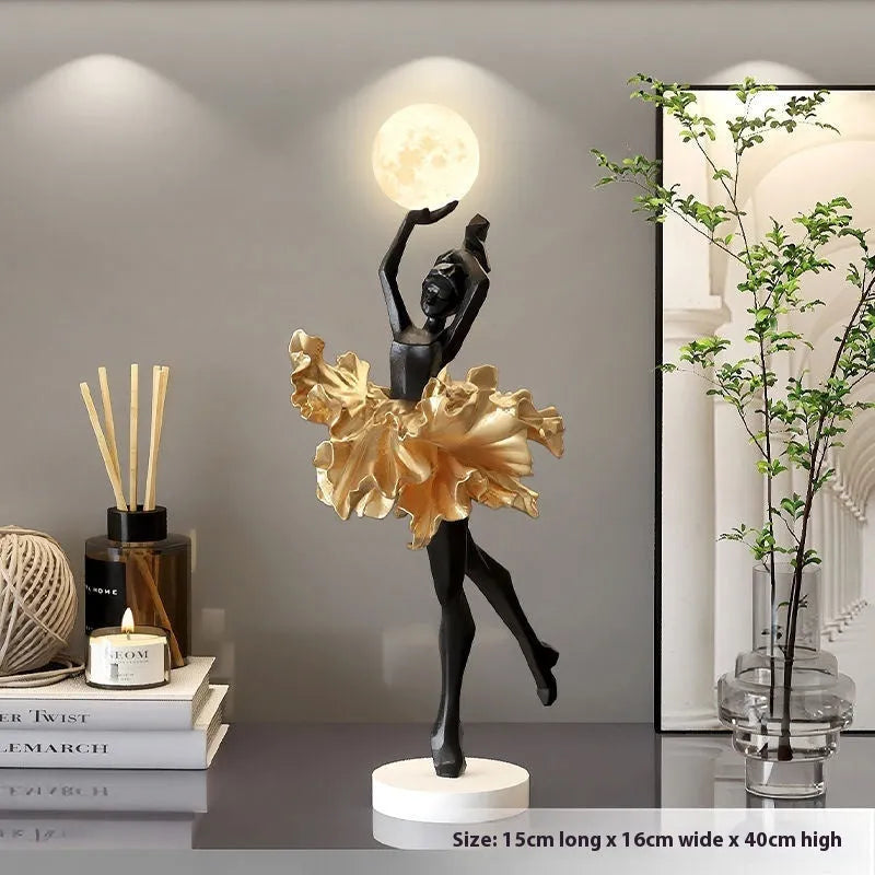 Small modern night lamp ornament in resin showing colour options: black gold, white, pink, and light blue.