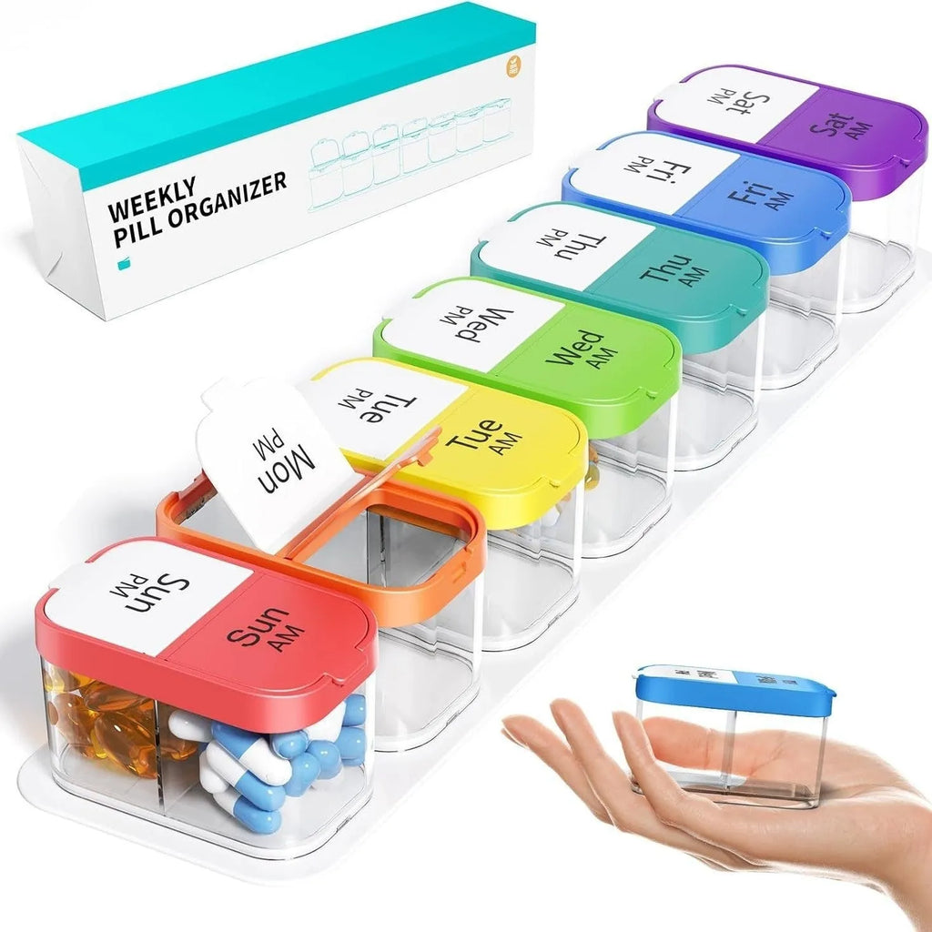 White and rainbow coloured large plastic pill box with 14 removable compartments next to detached single grid.