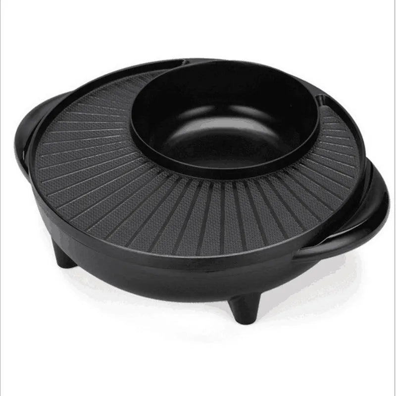 Black electric hot pot grill with teppanyaki plate and control panel, 5-6 litre capacity
