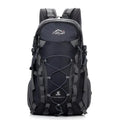 Green outdoor sports backpack with 20-35L capacity for hiking and camping activities