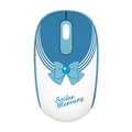 Pink Sailor Moon cartoon character wireless mouse on a desk next to a laptop.