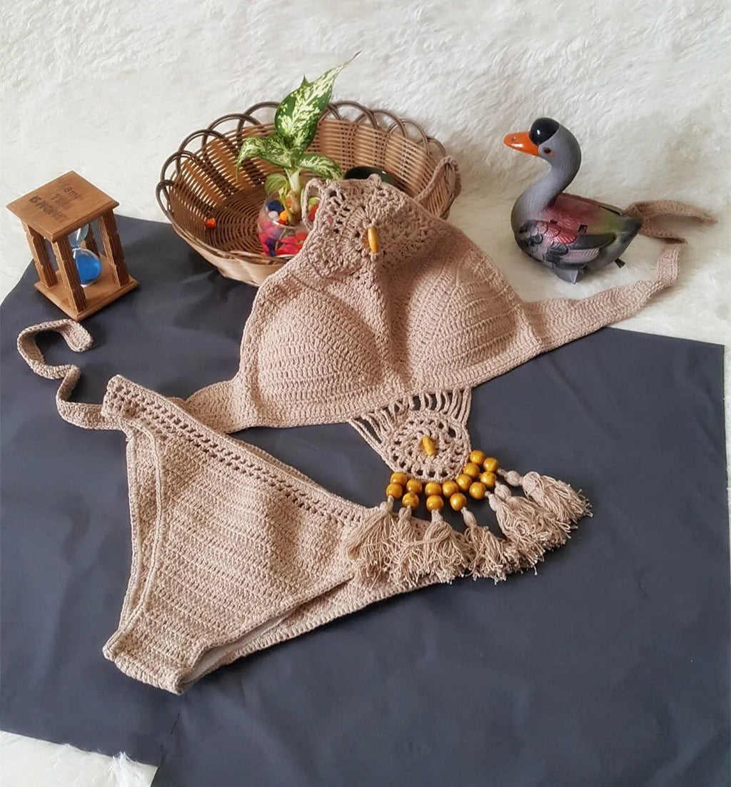 Crochet tassel bikini set for women in black, showing textured weave and tassel trim, beach style