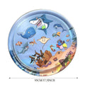Large square blue water playmat for cats with floating fish toys inside, shown on a floor.