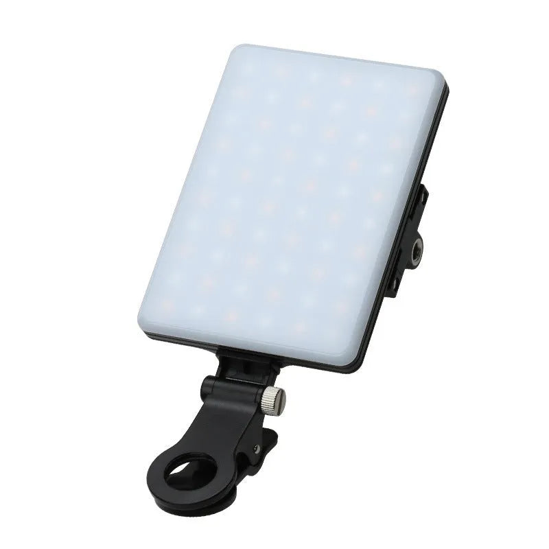 Compact white mobile phone fill light with adjustable head and mounting clips for video calls