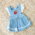 Bondi Blue strawberry and denim pattern dog skirt for small dogs on a mannequin.