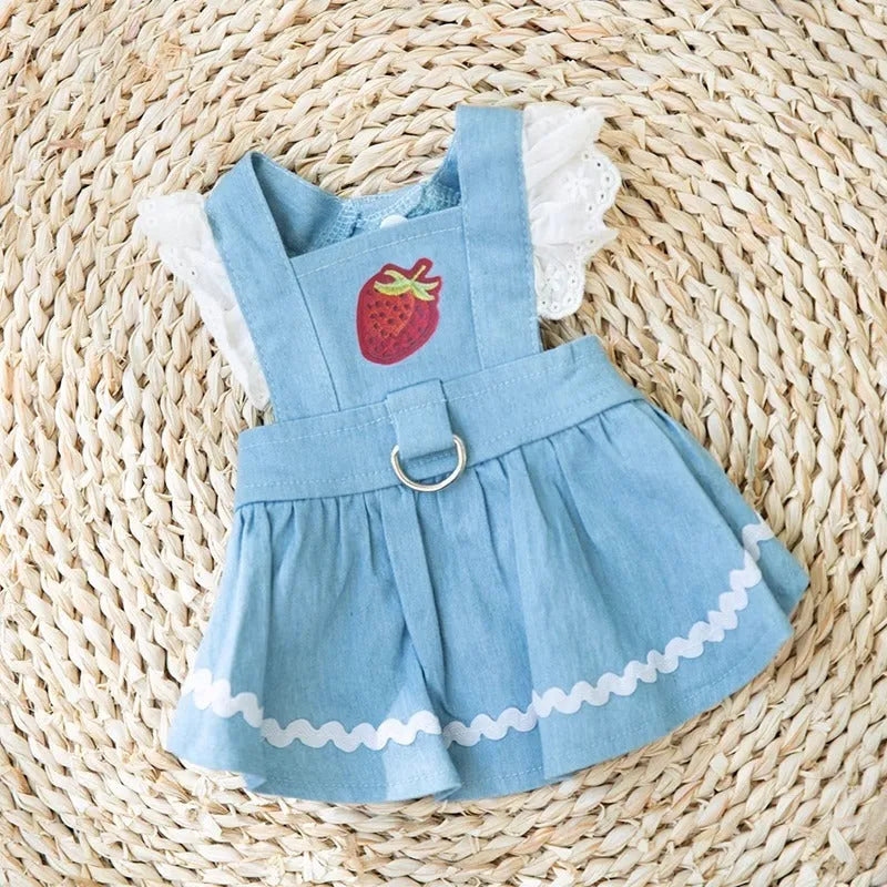 Bondi Blue strawberry and denim pattern dog skirt for small dogs on a mannequin.