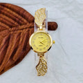 Stainless steel women's watch with round dial and Vachette clasp in gold, black and gold, or gold and white.