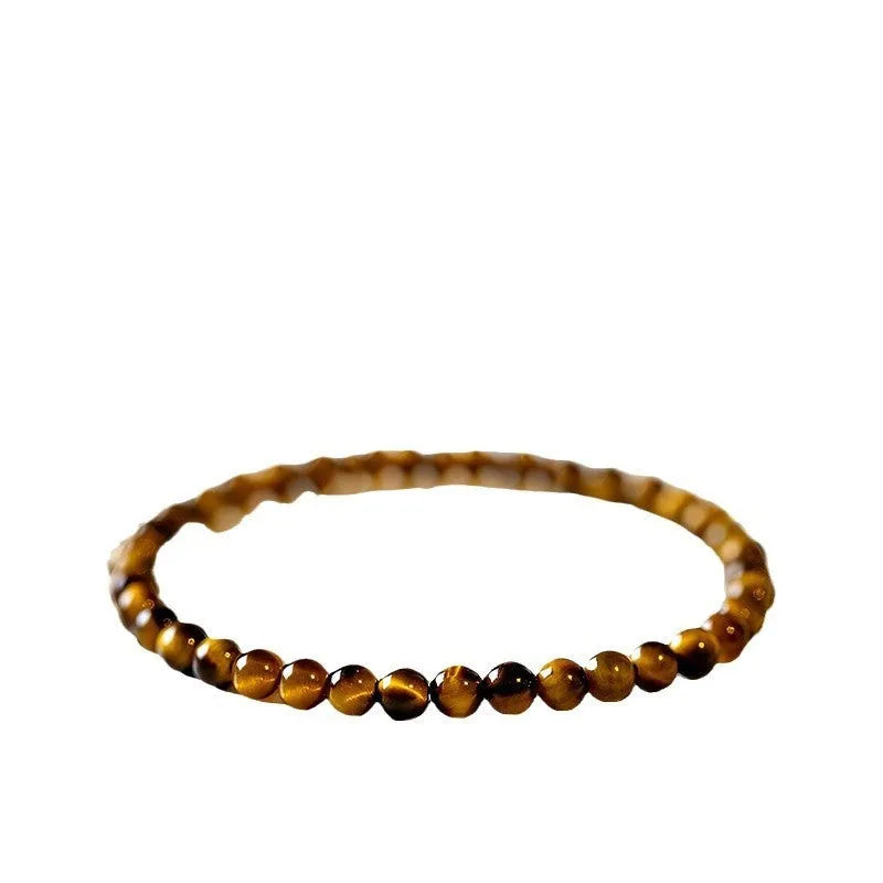 Tigereye stone bracelet with geometric design showing round beads in new Chinese style