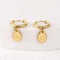 A pair of stainless steel ellipse-shaped stud earrings with butterfly clips on a white background.