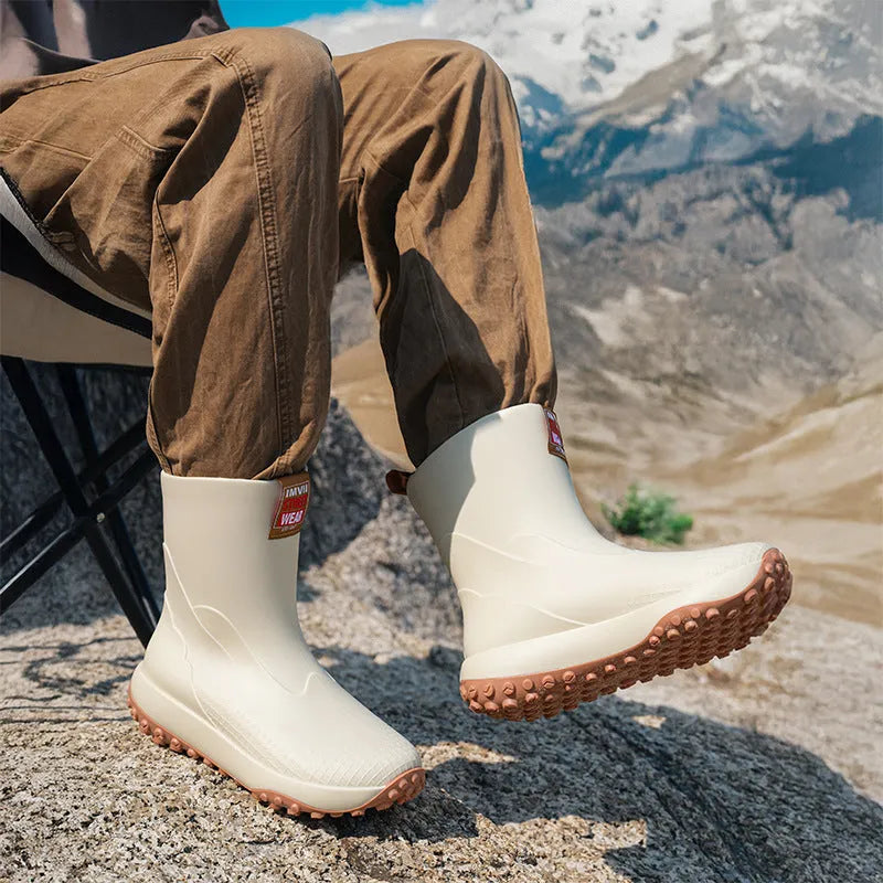 Men's mid tube PVC rain boots in beige colour with round toe and flat heel design