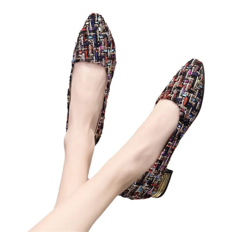 Women's black pointed-toe canvas casual shoes with flat rubber sole