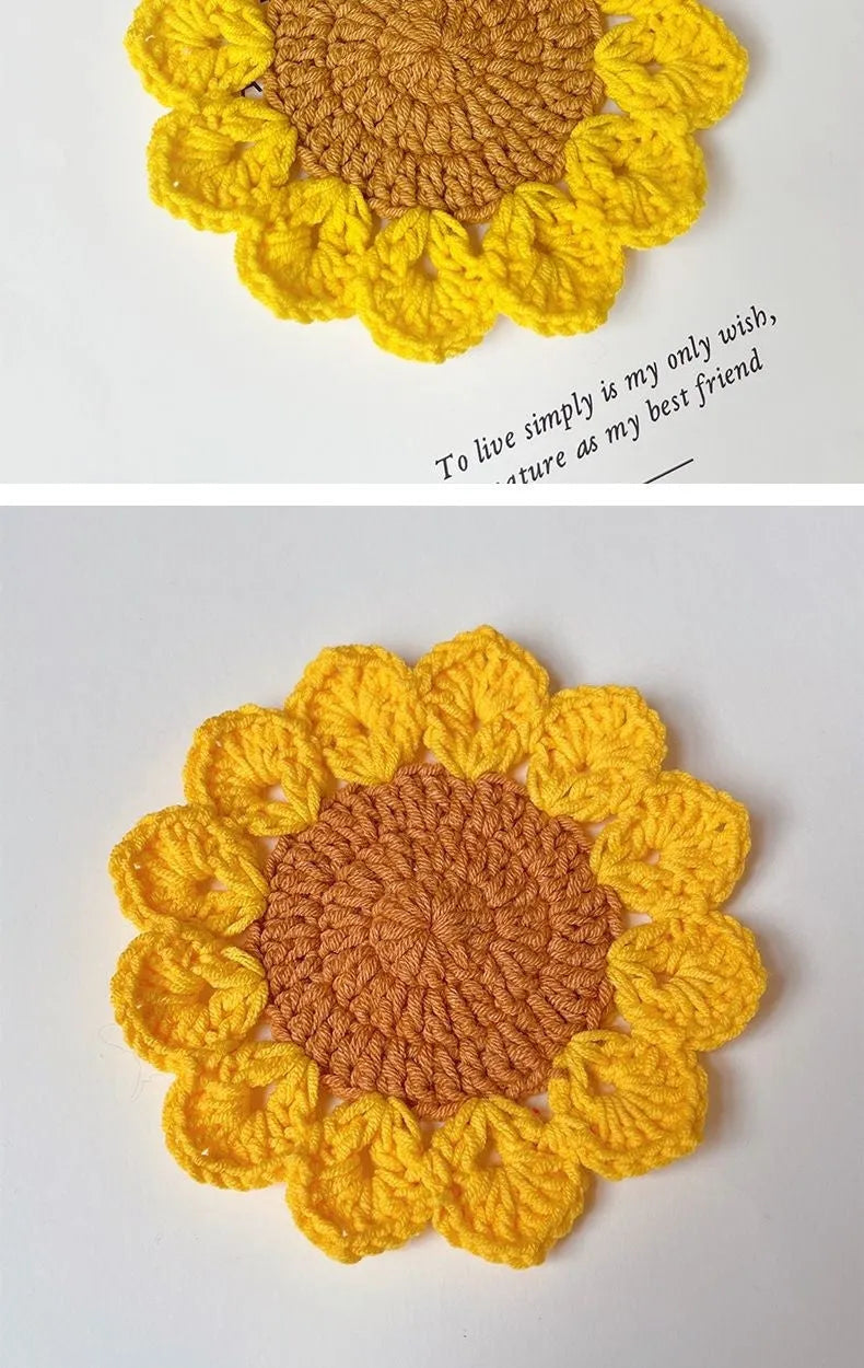 A hand-woven circular wool coaster with a floral pattern, shown as a single piece.
