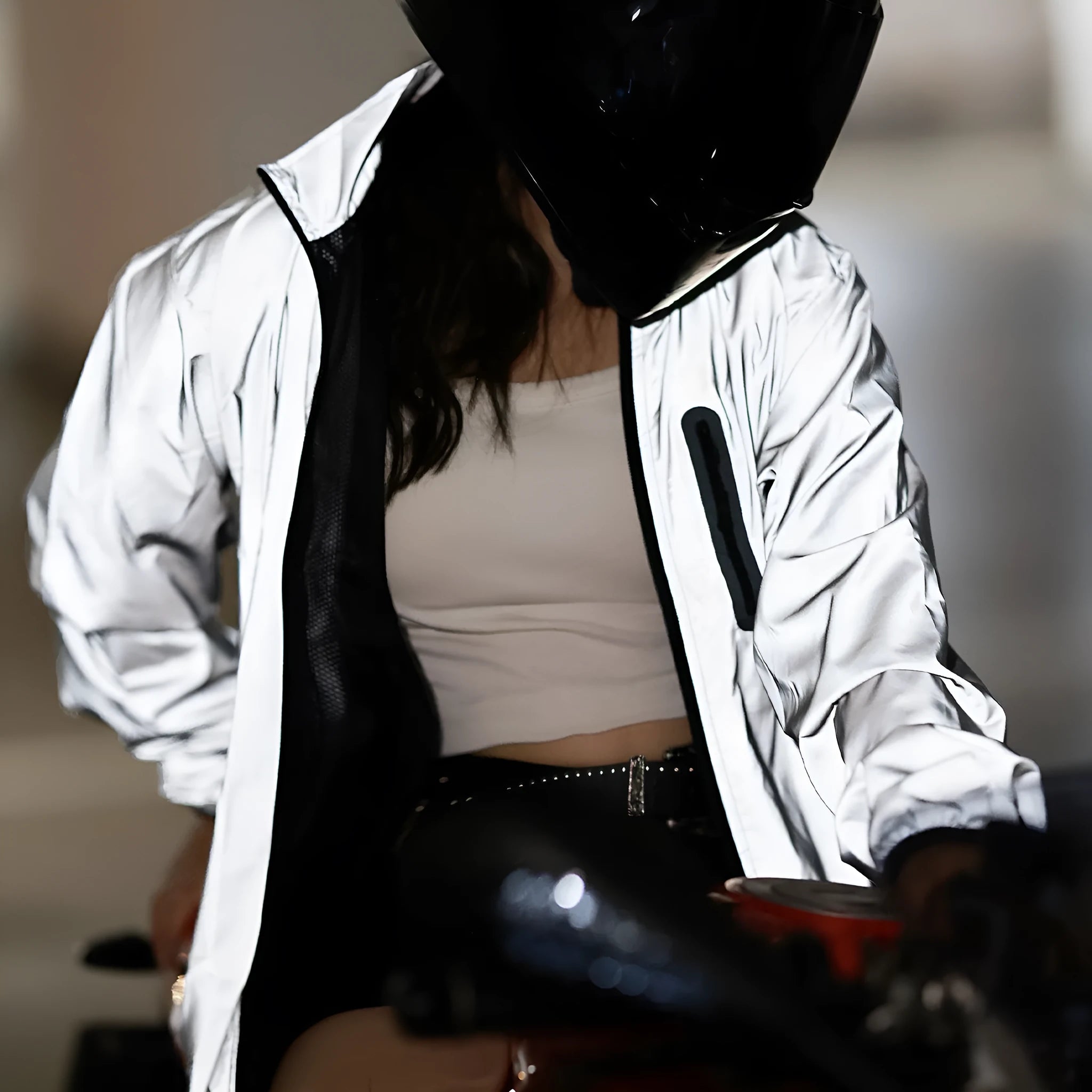 Silver men's waterproof polyester long-sleeved coat on a hanger.