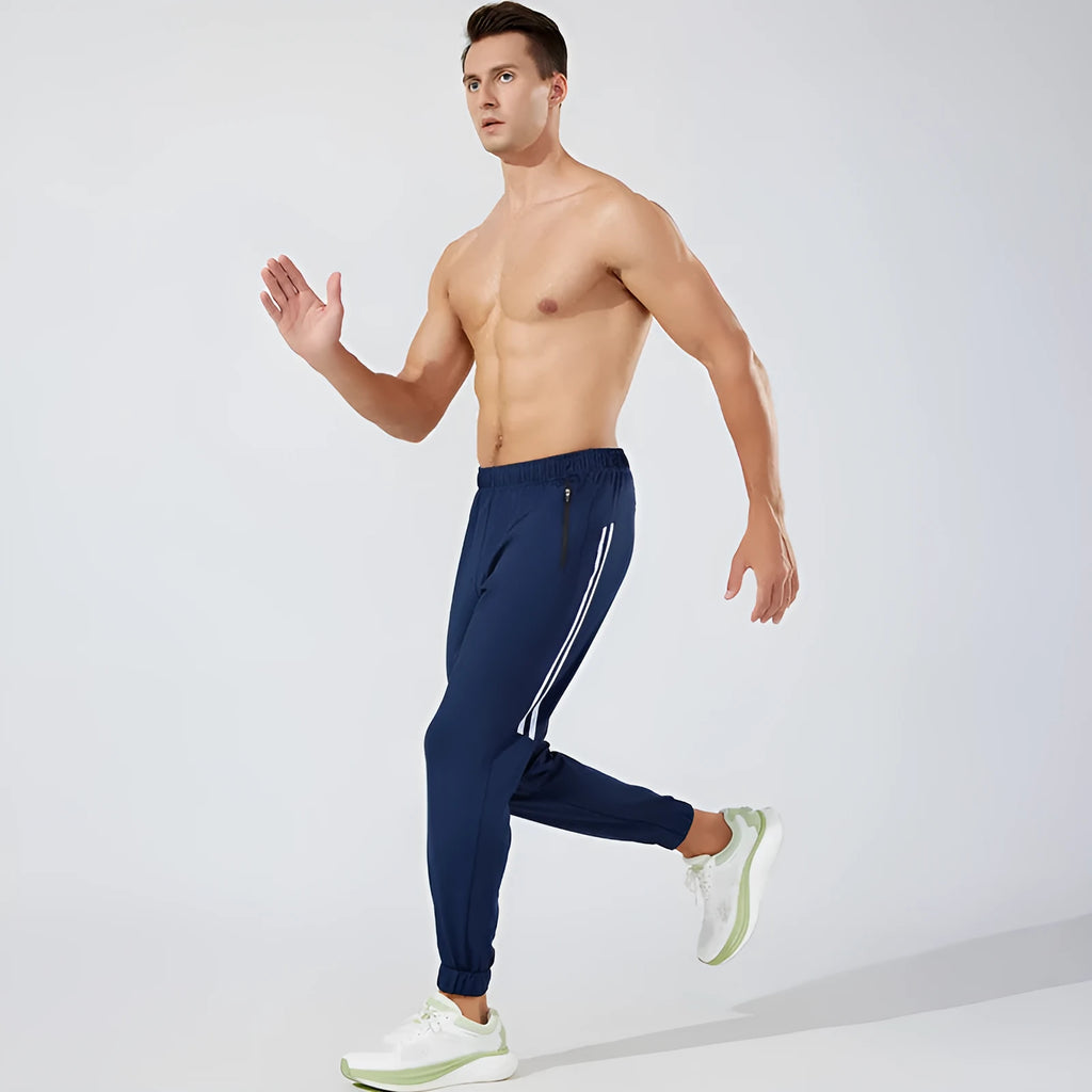 Men's black polyester running exercise pants with a mid-waist fit.
