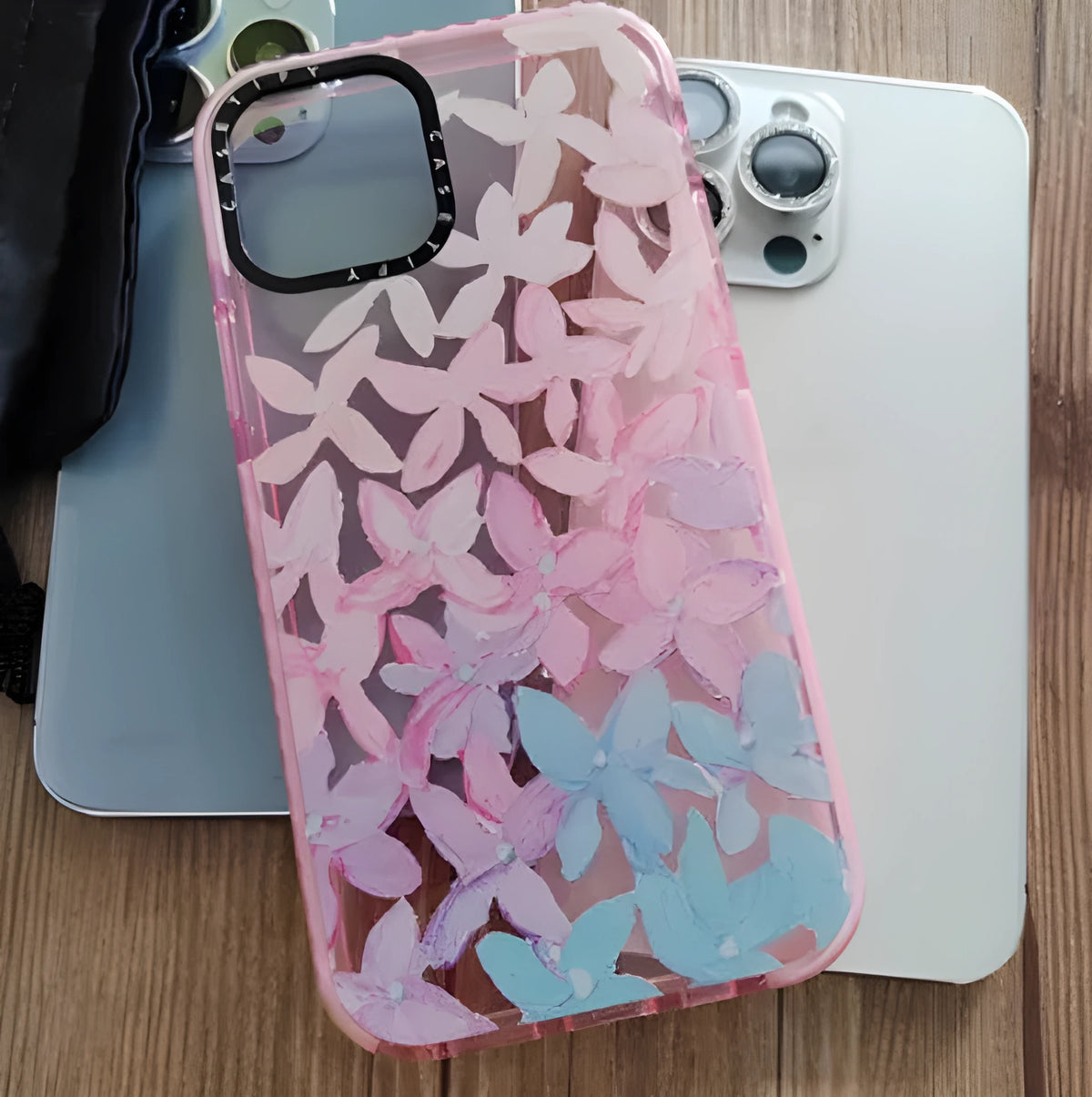 Transparent TPU phone case with pink and blue petal pattern for iPhone models