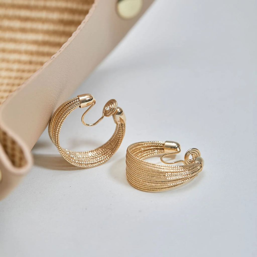 Geometric multi-layer copper earrings with stud and clip options in silver and gold finishes