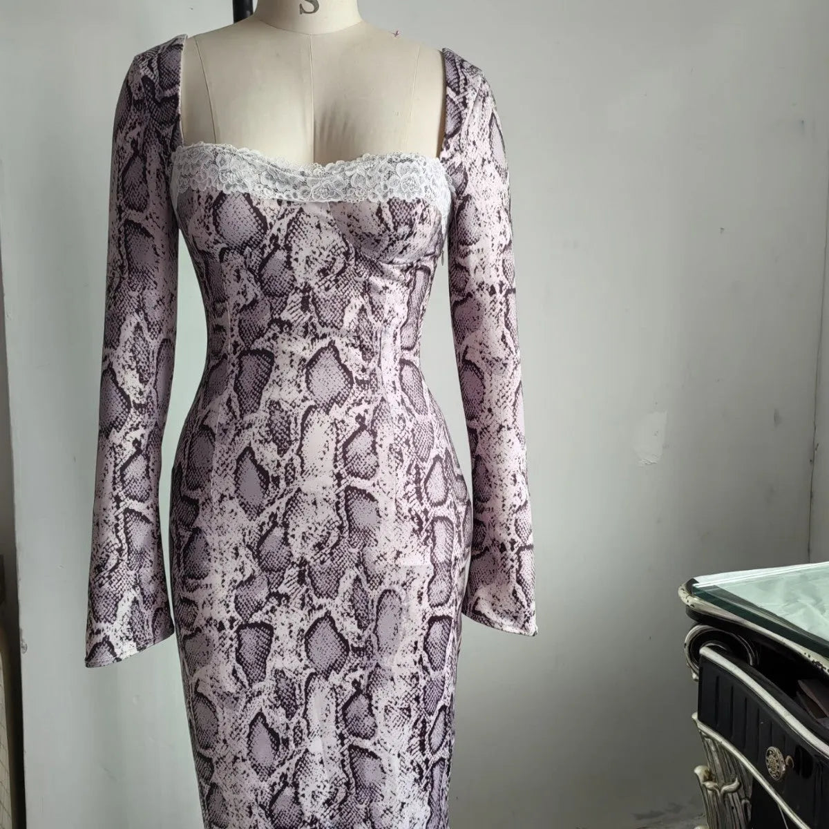 Grey digital printed lace dress with 3D effect pattern, long sleeves, and A-line silhouette