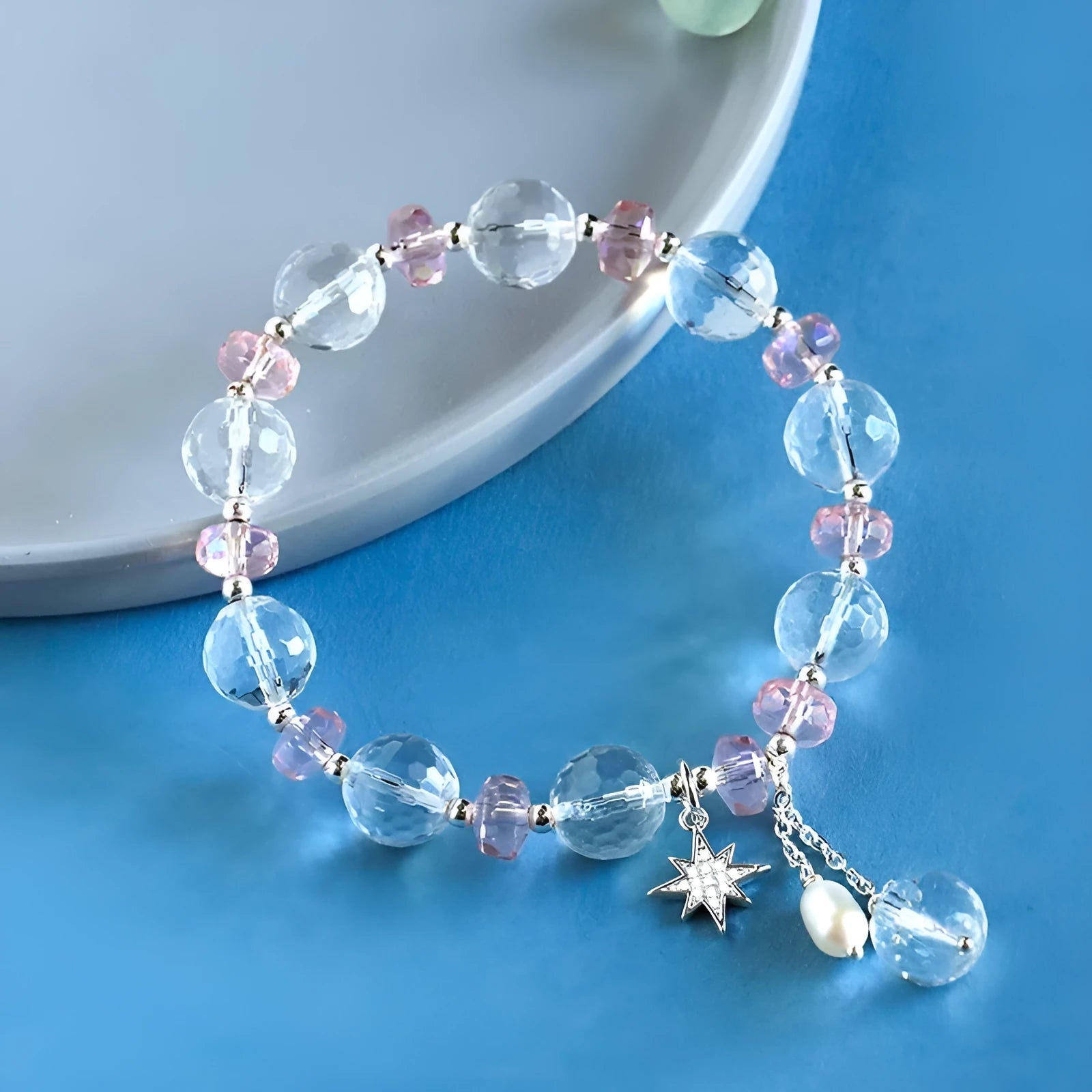 White crystal women's bracelet with diamond-shaped charms and lucky cat element on silver-tone chain