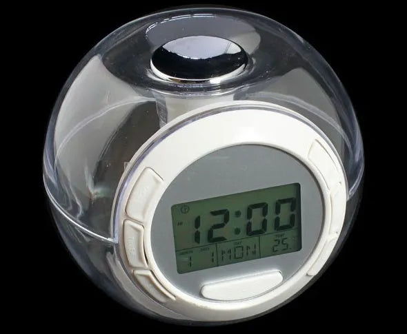White colourful natural sound alarm clock with large LCD display showing time and temperature, featuring 6 nature sounds and 7 colour cycle night light