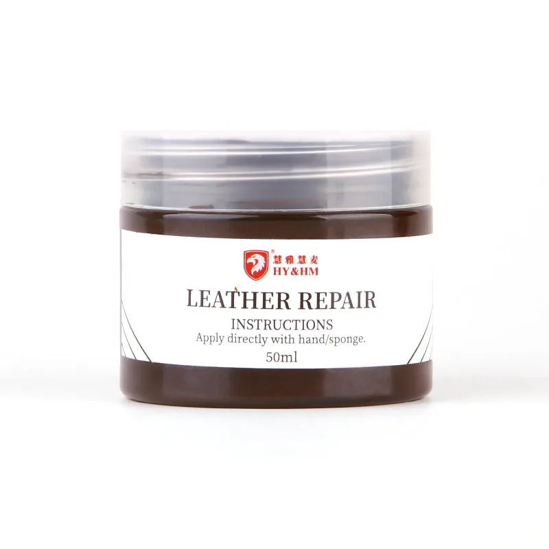 Leather repair cream in a round tin, available in multiple colours including black, blue, and red